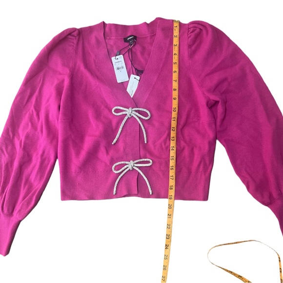 NWT Express Women’s Pink V-Neck Embellished Bow Cardigan
Size:Medium - Picture 3 of 6